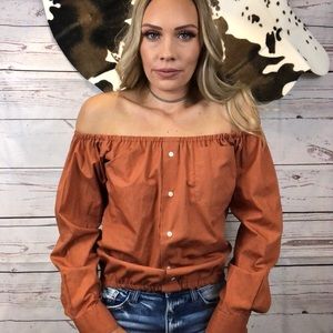 Desert orange off the shoulder button up top